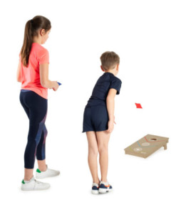 Hra Cornhole - ház a trefujte fazolkovými kapsami